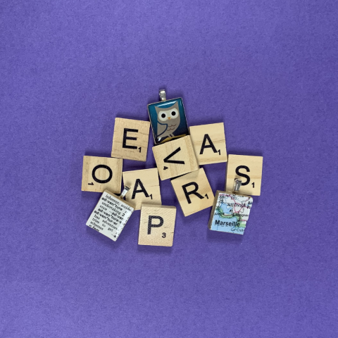 a selection of sample pendants made from Scrabble tiles