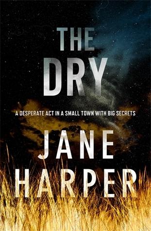 book cover with flames along the bottom below and image of a rural landscape and the text "The Dry"