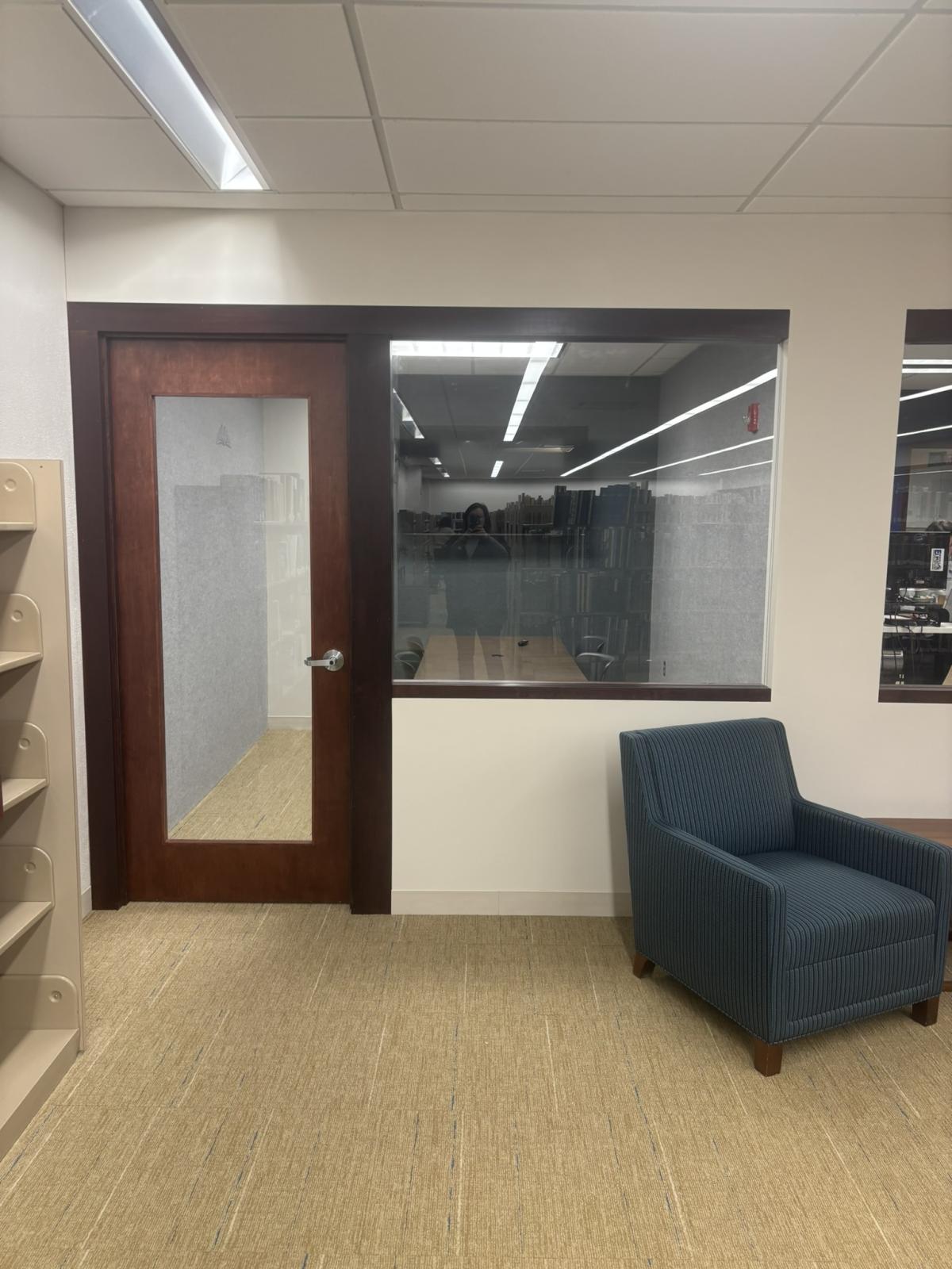 Image of Room with door and window shown